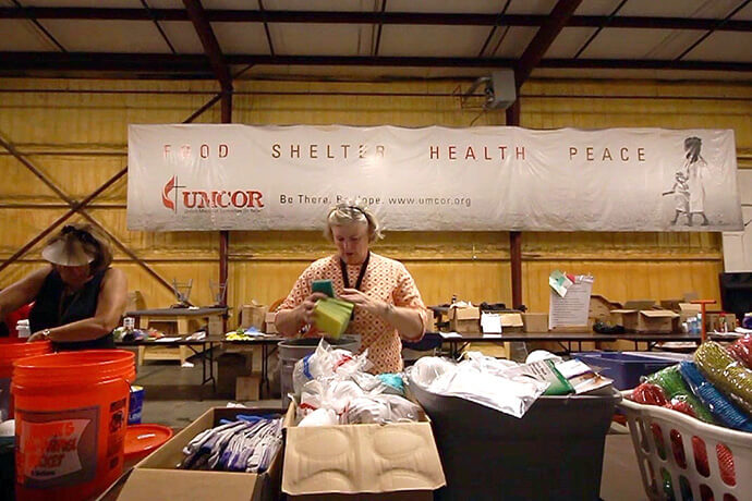 Volunteers pack relief supply kits at the United Methodist Committee on Relief’s Sager Brown Depot in Baldwin, La. UMCOR announced that it will no longer operate the depot, starting January 2027, as it looks to modernize the way the relief agency manages materials and reduce costs. Photo courtesy of the Louisiana Conference. 