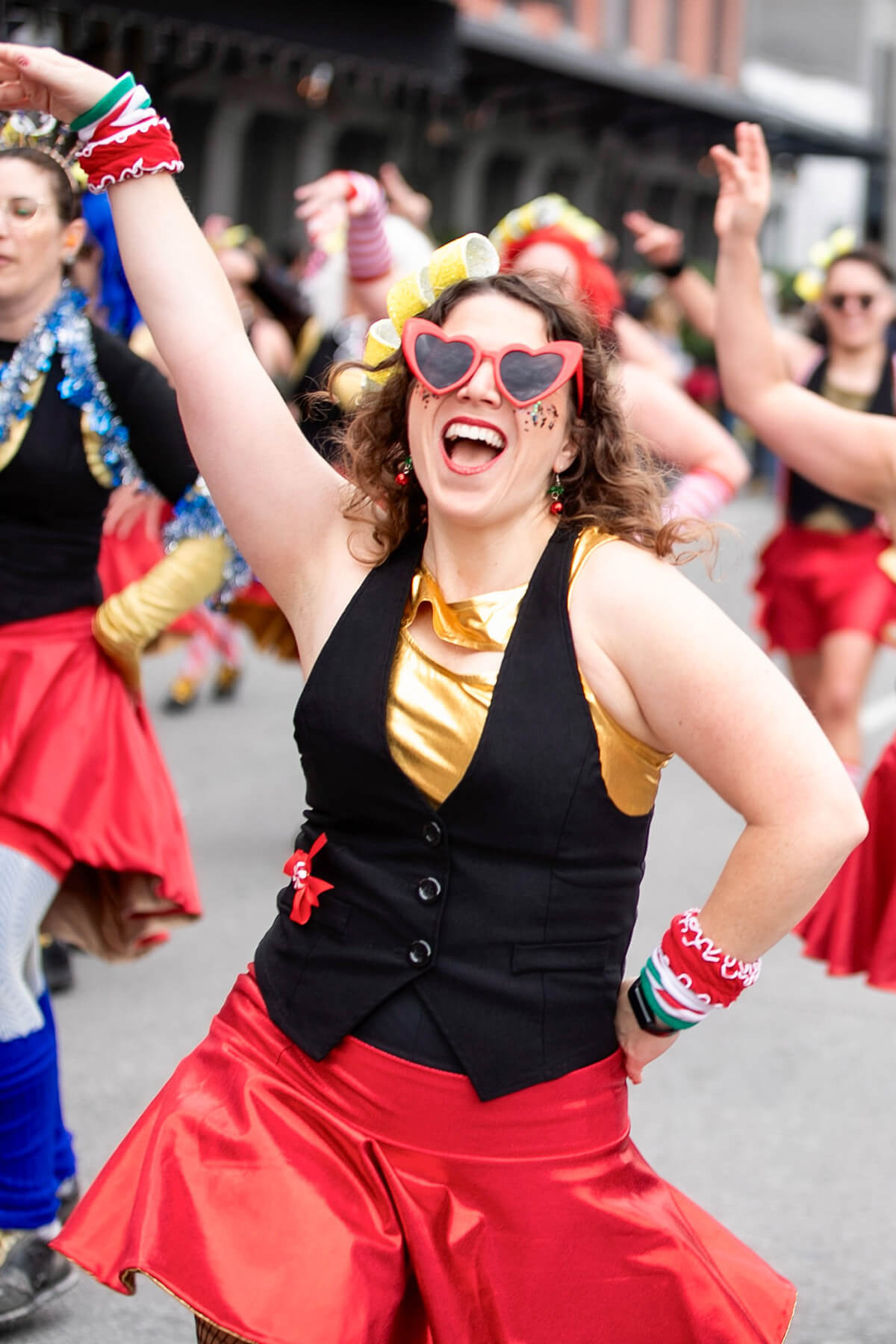 The Rev. Colleen Bookter, a United Methodist, dances in New Orleans Mardi Gras parades as a member of the dance krewe Sassyracs. “There is nothing like hundreds of thousands of people in the crowd cheering you on and dancing along with you,” she said. Photo by Nkechi Chibueze, courtesy of Bookter.