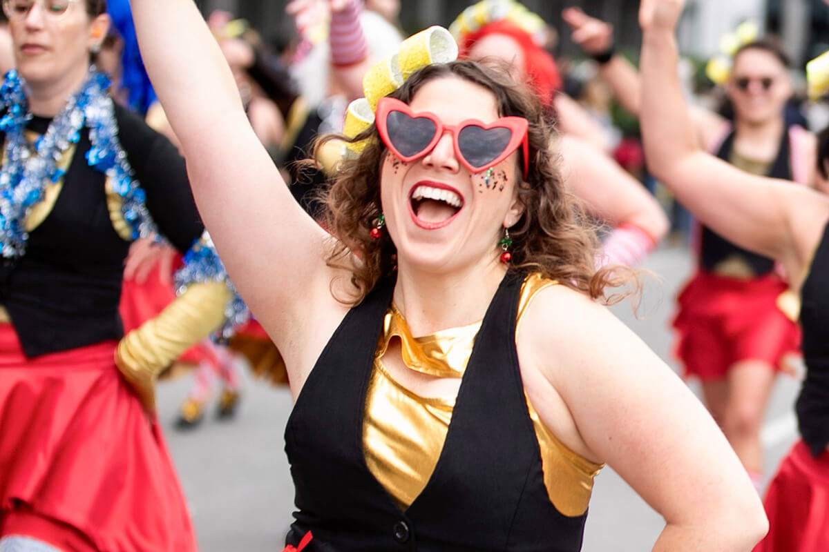 The Rev. Colleen Bookter, a United Methodist, dances in New Orleans Mardi Gras parades as a member of the dance krewe Sassyracs. “There is nothing like hundreds of thousands of people in the crowd cheering you on and dancing along with you,” she said. Photo by Nkechi Chibueze, courtesy of Bookter.