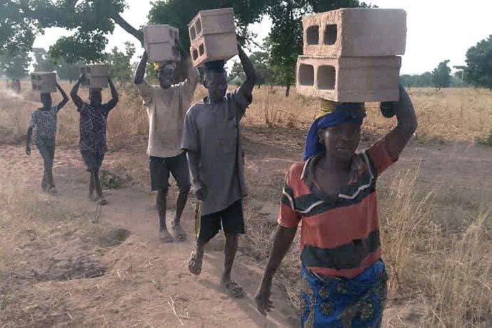 Members from the Panya Community in the Karim Lamido Local Government Area in northern Taraba State, Nigeria, have joined forces with The United Methodist Church in Nigeria to supply bricks to build a health clinic. The members from diverse religious backgrounds will benefit from accessible quality health care when the clinic is constructed. Photo courtesy of UMCN Communications.
