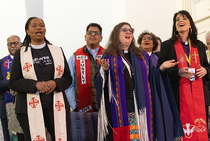 Faith leaders sing during opening worship for “Faithful Resistance: A Public Witness for Immigrant Justice” at Capitol Hill United Methodist Church in Washington on Feb. 25. Photo by Mike DuBose, UM News.