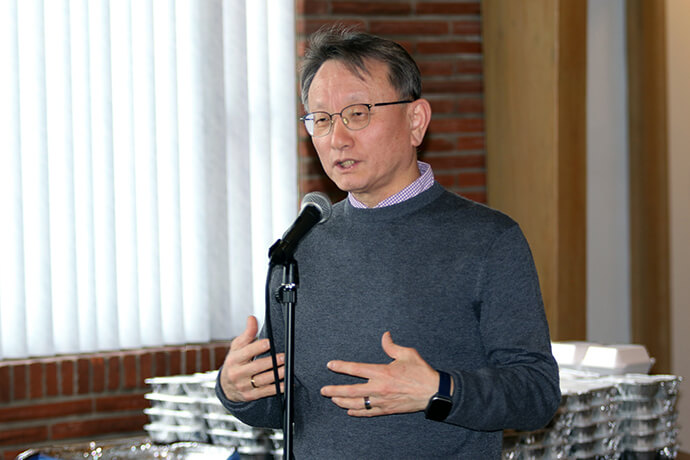 The Rev. Inhwa Son of Black River Falls United Methodist Church in Wisconsin welcomes guests during the second anniversary of its “Dinner Church.” “(The ministry) is changing how people see the church,” Son said. “It breaks down barriers.” Photo by the Rev. Thomas E. Kim, UM News.