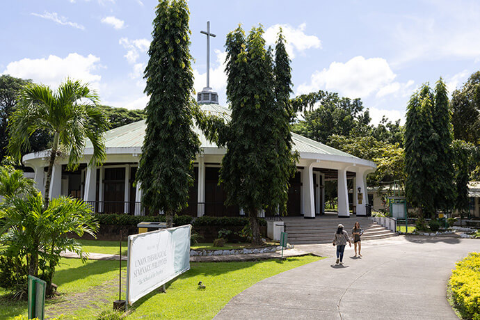 Students walk near Salakot Chapel at Union Theological Seminary in Cavite, Philippines. The aim of Miracle Sunday is to support 500 scholarships annually for United Methodist students preparing for ministry in Africa, Europe and the Philippines. File photo by Mike DuBose, UM News. 