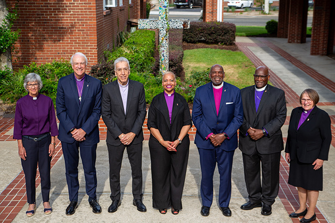 The current officers of the Council of Bishops stand together on April 26 after a memorial service hosted by Arlington United Methodist Church in Jacksonville, Fla. From left, they are: Bishops Hope Morgan Ward, co-ecumenical officer; Thomas J. Bickerton, immediate past president, Ruben Saenz Jr., president-designate; Tracy S. Malone, current president; L. Jonathan Holston, secretary; Gregory V. Palmer, executive secretary; and Rosemarie Wenner, co-ecumenical officer. Photo by Paul Gómez, United Methodist Communications. 