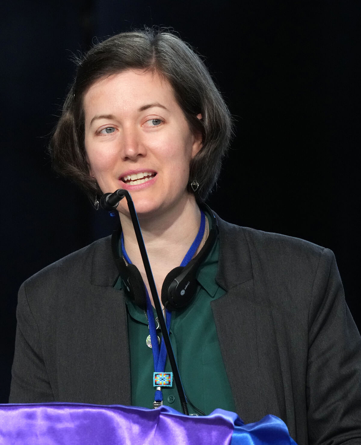 Emily Allen, a veteran lay delegate from the California-Nevada Conference, delivers a report during the 2024 United Methodist General Conference in Charlotte, N.C. on May 3, 2024. Allen has been elected to serve as the interim General Conference secretary beginning July 1. She will lead the planning of The United Methodist Church’s international legislative assembly, scheduled May 8-16, 2028, in Minneapolis. Photo by Larry McCormack, UM News.
