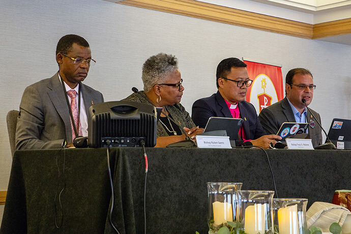 Bishops discuss the Christian faith and democracy April 30 at the Council of Bishops meeting in Jacksonville, Fla. The panel, from left, included Bishops Emmanuel Sinzohagera, LaTrelle M. Easterling, Israel Painit and Héctor Burgos-Núñez. Photo by Paul Gómez, United Methodist Communications.
