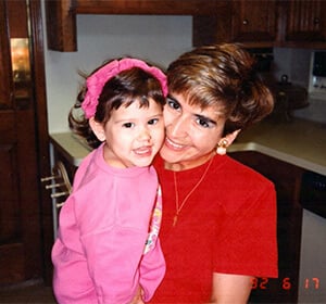 Twenty-month-old Elizabeth Harvey is held by her mother, Cynthia Harvey, in this 1992 photo. Elizabeth says she felt “immensely proud” when her mother rose to high leadership in the church, including serving as the first Hispanic female president of the United Methodist Council of Bishops. Photo courtesy of the Harveys.