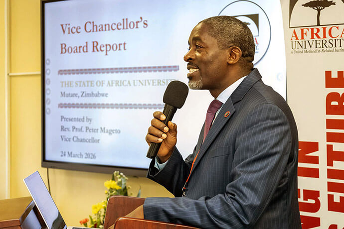 Africa University vice chancellor the Rev. Peter Mageto gives his report on the state of the institution during the institution’s March board meetings. Highlights from the report included an update on production at the university farm, which was resuscitated through a $500,000 grant from the United Methodist Board of Global Ministries. Photo courtesy of Africa University Advancement and Public Affairs Office.