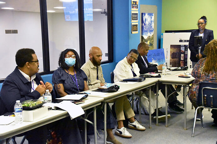 The Rev. Tiffany Tarrant (far right), pastor of St. John’s Downtown United Methodist Church in Houston, listens to a question during her workshop on Intergenerational Worship Planning. Photo by John W. Coleman, UM News.