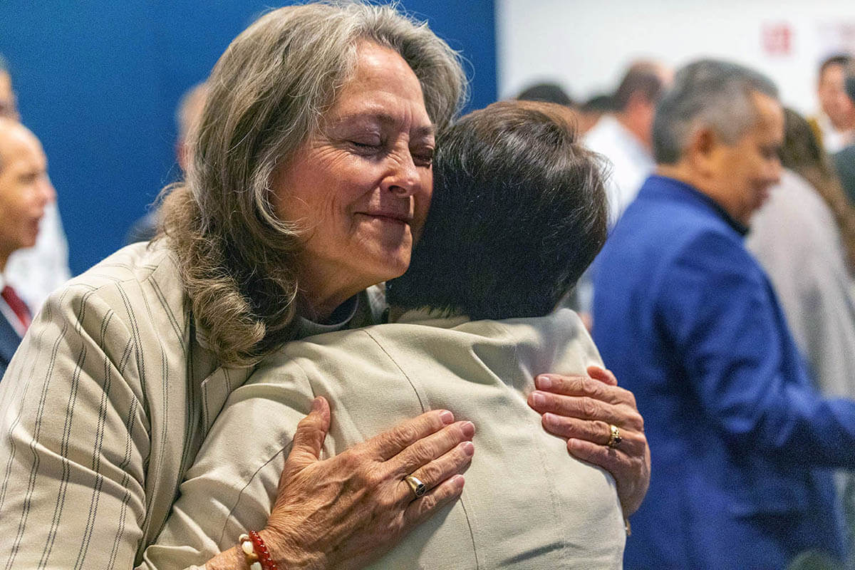 United Methodist Bishop Dottie Escobedo-Frank, episcopal leader of the California-Pacific Conference, hugs the Rev. Edith Molina during the Methodist Church of Mexico’s General Conference, held May 15-22 in Ciudad Juárez, Mexico. During the assembly, the Methodist Church of Mexico reaffirmed its concordat covenant with The United Methodist Church. Photo by Paul Gómez, United Methodist Communications.