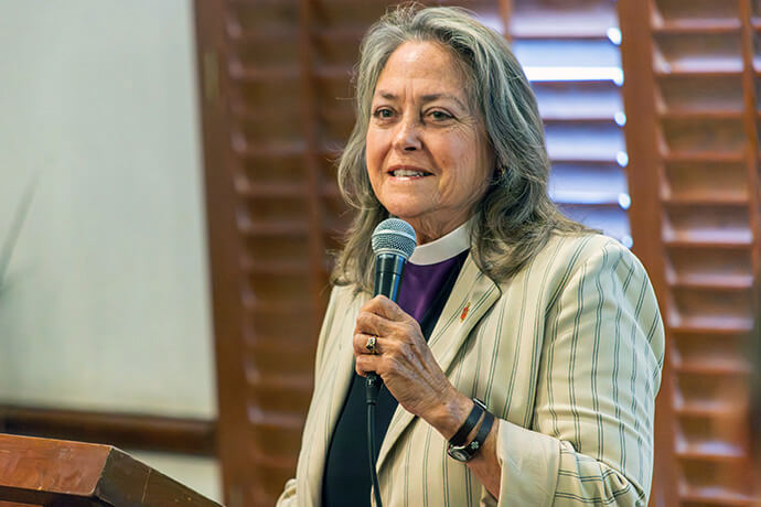 Bishop Dottie Escobedo-Frank speaks on the role of hospitality within Christian witness. “If we could all receive one another with the same warmth I have received here, we would be living the Kingdom of God on earth,” she said. Photo by Paul Gómez, United Methodist Communications.