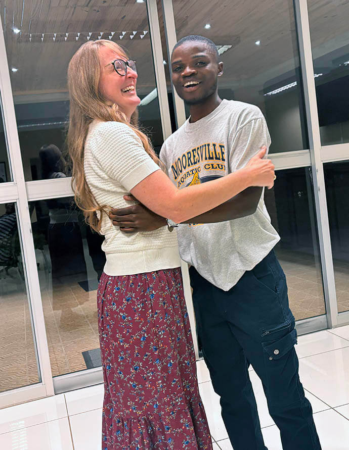 Traci Jones (left) and Isaac Sakala couldn’t hide their joy when they saw each other for the first time after a decade on the eve of Sakala’s graduation from Africa University. Jones and her husband, Mykal, traveled from Dallas to Zimbabwe to see Sakala graduate on June 6 with a degree in business management. Photo by Eveline Chikwanah, UM News.