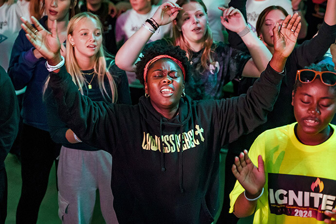 Young worshippers experience the music and message at IGNITE, a youth retreat cosponsored by the Greater New Jersey and Eastern Pennsylvania conferences in October 2024. The event is the only youth conference in the Northeastern Jurisdiction to return after the pandemic. File photo by Glaks Vega for EPA&GNJ Communications.