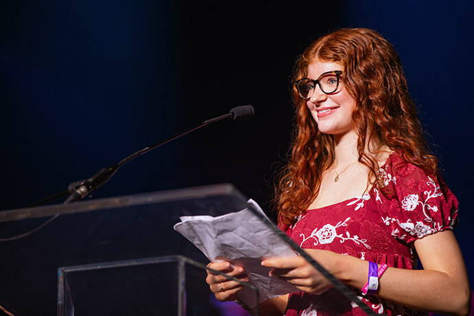 A young leader speaks on stage at the North Carolina Conference’s 2025 Pilgrimage youth retreat, which drew nearly 1,200 youth and adult leaders from across eastern North Carolina. File photo by Derek Leek, North Carolina Conference Communications.