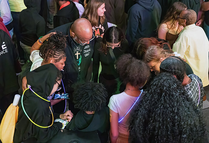 Youth pray together with adult leaders at the Baltimore-Washington and Peninsula-Delaware conferences’ March 2025 IGNITE retreat. The conferences adopted the IGNITE model created by the Eastern Pennsylvania and Greater New Jersey conferences. File photo by Alison Burdett, Baltimore-Washington Conference.