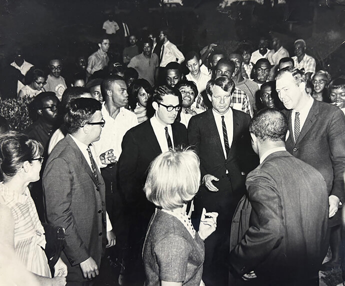 Tougaloo College students, faculty and administration give spontaneous reception for Sen. Robert F. Kennedy, center, as he visited the campus on April 10, 1967. At right next to Kennedy is the Rev. Ed King. 1967 photo by The Chronicle, courtesy of Tougaloo College.