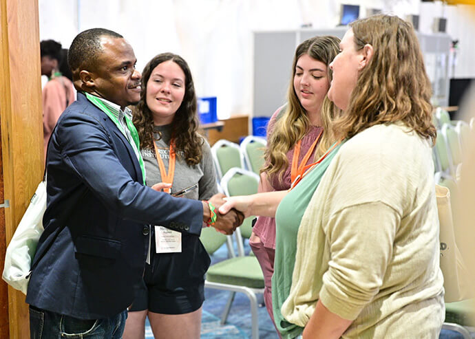 Mada Daniel Nkhoma from Malawi, part of Discipleship Ministries’ Young People’s Connectional Network, greets fellow attendees on the opening day of the Global Young People’s Convocation in Dublin. Young people from many nations and backgrounds attended the gathering with its focus on building new relationships. Photo by the Rev. M. Scott Hughes, Discipleship Ministries.