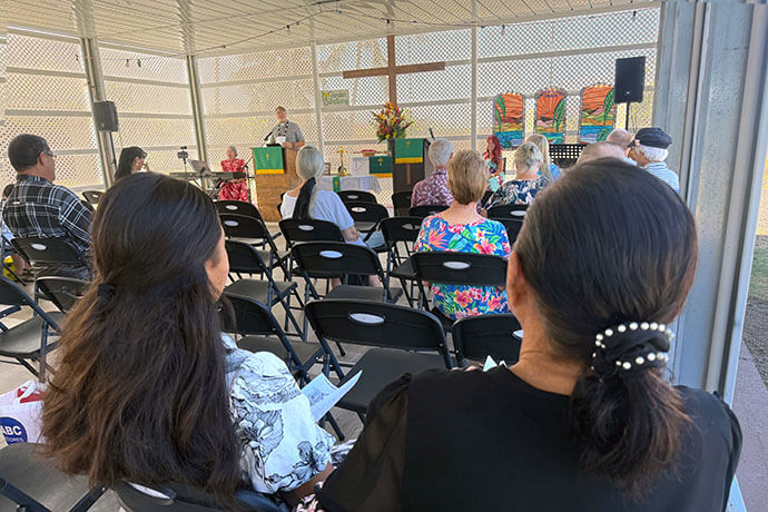 The congregation of Lahaina United Methodist Church holds Sunday worship in an open-air pavilion nearly three years after the church’s 100-year-old sanctuary was destroyed by wildfire. Over three-quarters of church members lost their homes in the same fire. Photo by Lilla Marigza, UM News.