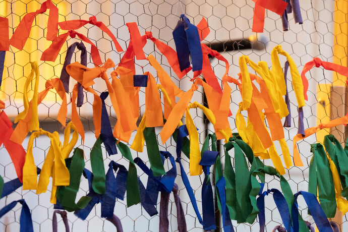 Parishioners created a rainbow of ribbons tied to chicken wire during worship at Glendale United Methodist Church.