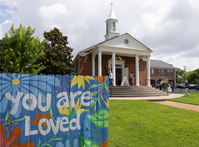 A sign proclaiming God’s love for all stands in the front lawn of Glendale United Methodist Church.
