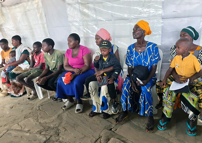 Patients wait to be seen by doctors and other medical staff during a free health clinic in Mwakirunge, Kenya. More than 600 people received care during the three-day camp. Photo by Selina Mutua, UM News.  