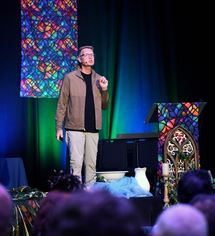 Carey Nieuwhof, an author and consultant on leadership, productivity and church growth, speaks during the RISE UP conference in Columbus. In his presentation on artificial intelligence, Nieuwhof said he believes the technological advancements will “produce a hunger for God, a hunger for people, a craving for what’s real in a world of artificial everything.” Photo by Scott Hughes, Discipleship Ministries. 