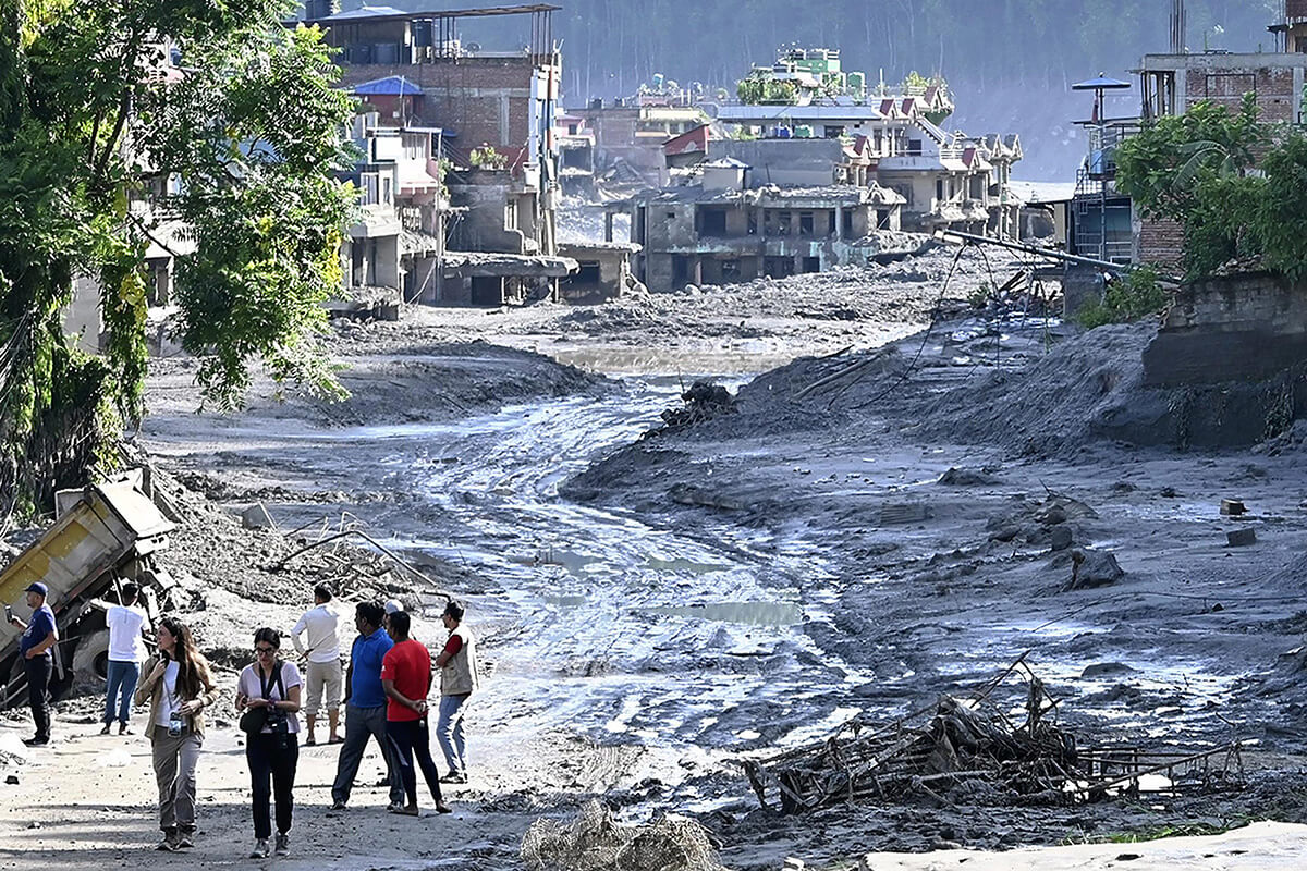 A disaster site hit by a massive debris flow along a tributary of the Bhotekoshi River is seen in Bidur, Nepal, on Aug. 28. Nepalese police said the death toll had reached 469 as of the morning of Aug. 28 after catastrophic flooding and debris flows struck the Nepal-Tibet border region. Photo by Yomiuri Shimbun, via AP. 
