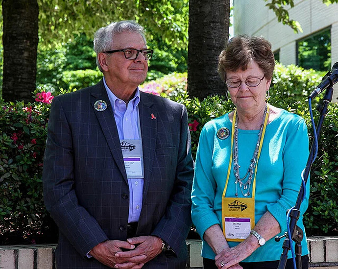 Bishop Fritz Mutti and his wife, Etta Mae Mutti, observe a moment of silence during an AIDS Vigil held May 11 at the United Methodist 2016 General Conference in Portland, Ore. The vigil was sponsored by the United Methodist Global AIDS Committee. File photo by Maile Bradfield, UM News.
