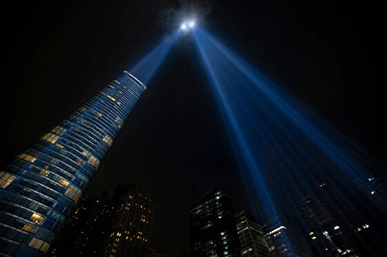 The Tribute in Light is an art installation created in remembrance of those who perished in the Sept. 11, 2001, terrorist attacks on the World Trade Center in New York City. It consists of 88 vertical searchlights arranged in two columns to represent the twin towers that came down in the attack. On clear nights, the lights can be seen over 60 miles away. Photo courtesy of the National 9/11 Memorial & Museum.