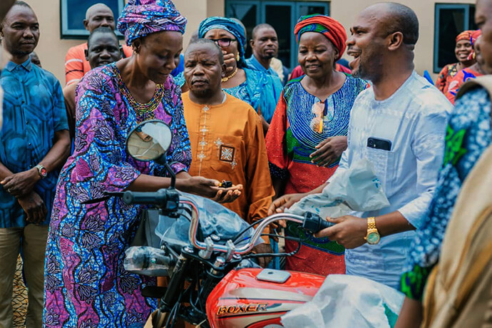 Nigeria Area Bishop Ande I. Emmanuel (right) hands over the keys to a new motorcycle to the Rev. Antiya Ishaya, superintendent of the Gwadum Radi District, at a ceremony in Jalingo, Nigeria. The bishop helped to distribute 48 motorcycles to district superintendents across the five annual conferences in the country to make it easier for them to carry out ministry in hard-to-reach rural areas. Photo by Dauda Idris Balasa, UM News.