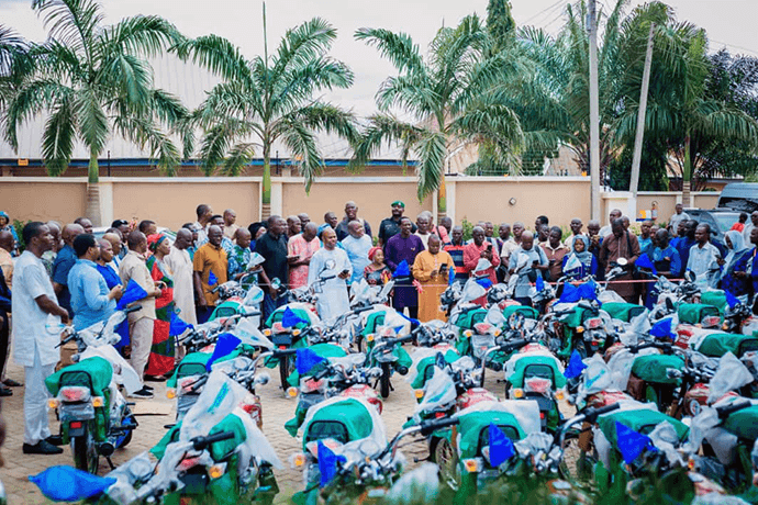 Bishop Ande I. Emmanuel leads a prayer of thanksgiving with worshippers and church leaders before the official commissioning and distribution of motorcycles in the Nigeria Episcopal Area. The major investment by the Nigeria Episcopal Area aims to remove logistical obstacles so that district superintendents can expand the mission of The United Methodist Church into remote communities. Photo by Joseph Dauda Idris Balasa, UM News.