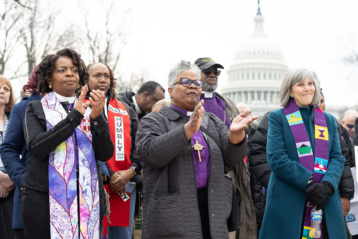 Bishop Cynthia Moore-Koikoi (from left), Bishop LaTrelle Easterling, the Rev. Erica Robinson Johnson and other faith leaders participate in a public witness for immigrant justice near the U.S. Capitol in Washington on Feb. 25. United Methodist leaders are cheering an Oct. 20 U.S. federal appeals court ruling that allows faith groups, including United Methodists, to move forward with a lawsuit to stop a Trump administration policy that allows immigration enforcement within houses of worship. File photo by Mike DuBose, UM News.