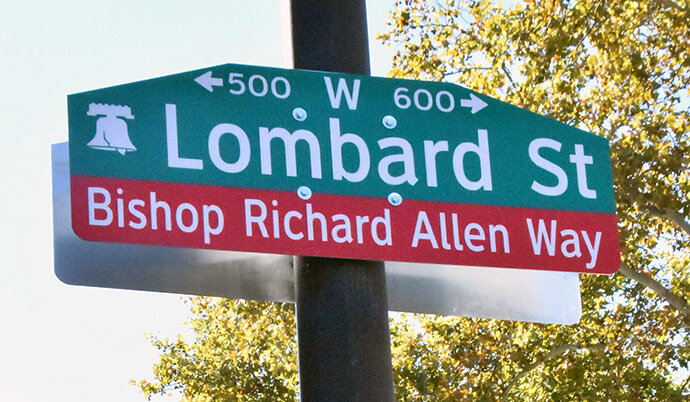 The new Bishop Richard Allen Way sign hangs at the corner of 6th and Lombard streets in Philadelphia. Photo by John W. Coleman, UM News. 
